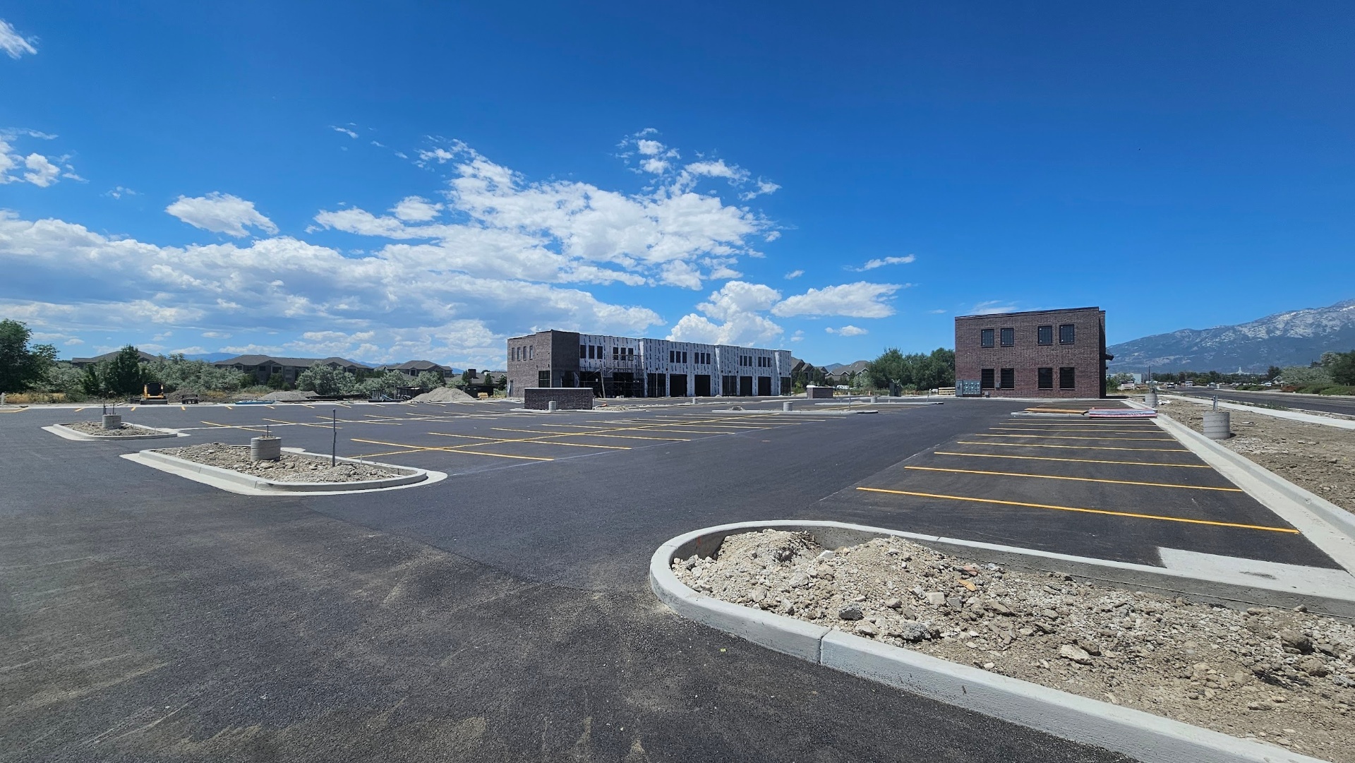 Large retail parking lot with fresh yellow stripes