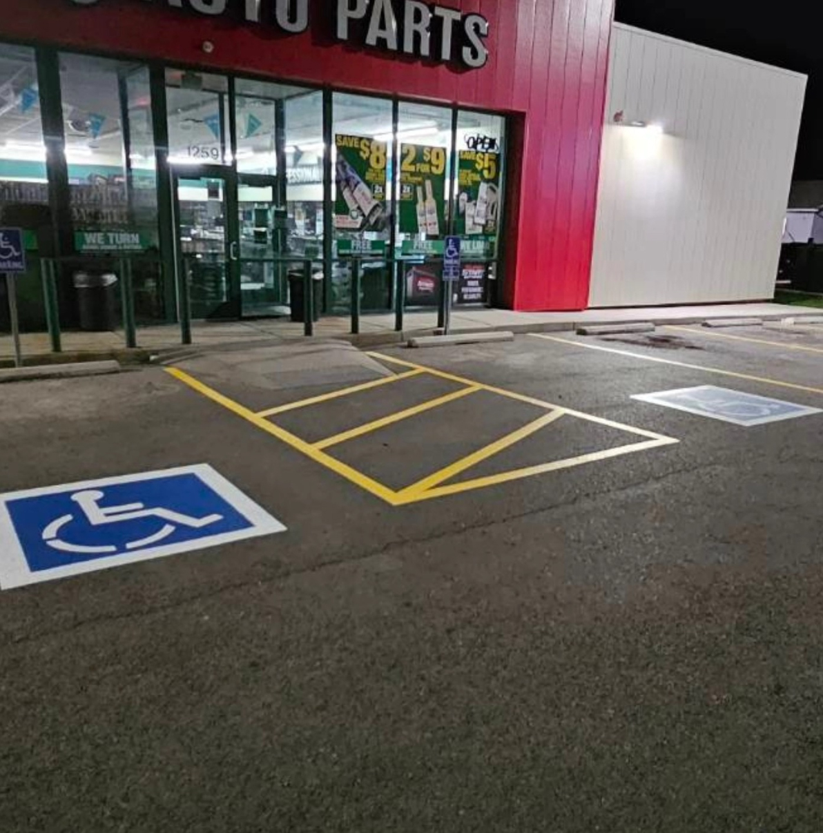 Large retail parking lot with fresh yellow stripes